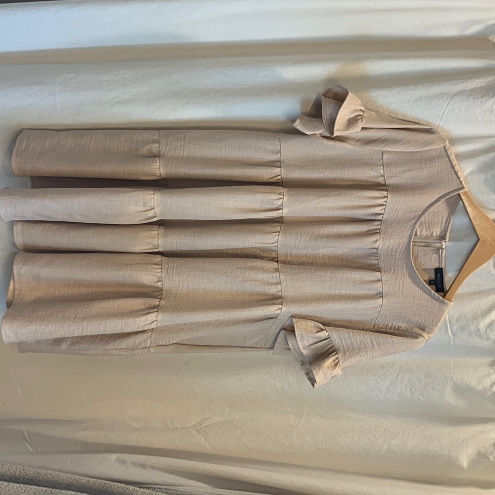 Light tan tiered dress. New. Never worn.